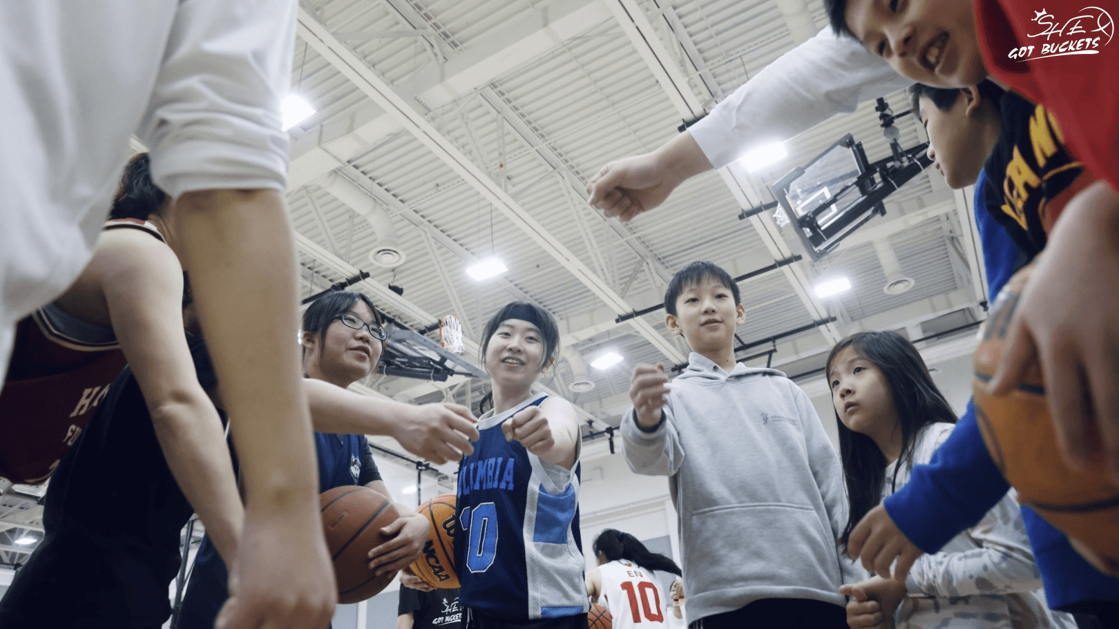 Basketball players on court