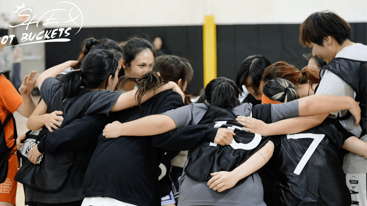 Asian women playing basketball
